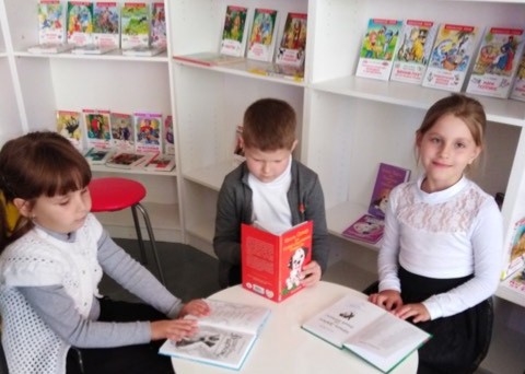 Children enjoy reading room at Chausy School #1